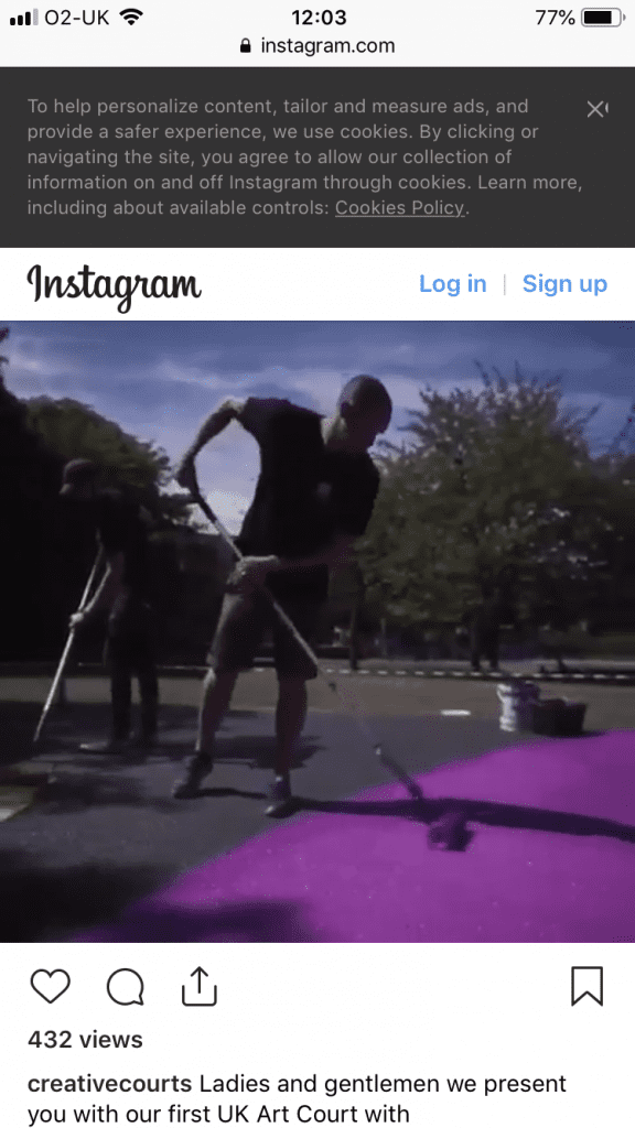 Rolling Purple paint on to basketball court