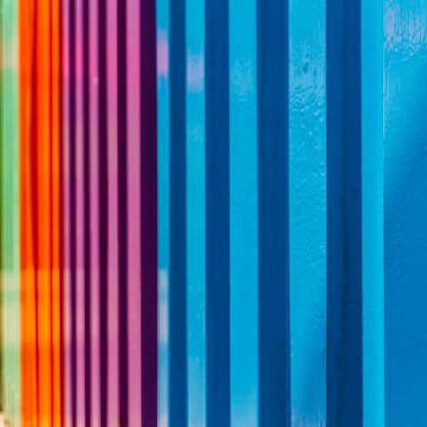 Multi-coloured fence paint example