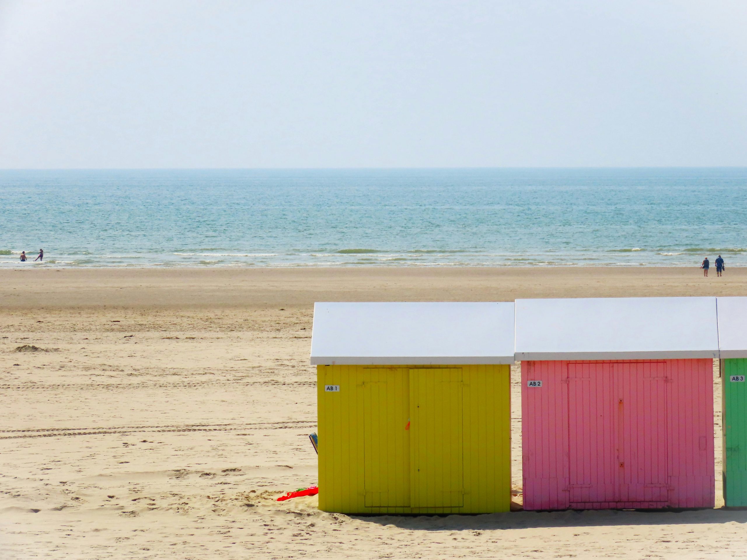 Colourful Wooden huts by the sea